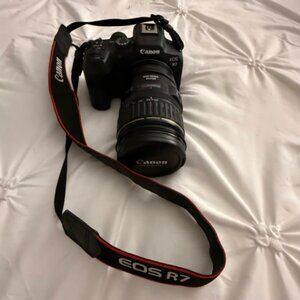 Canon EOS R7 with 28-135mm lens and adaptor